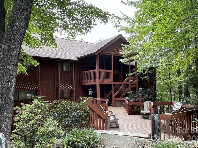 221 Toxaway Falls Drive, Lake Toxaway, NC 28747.  MLS# CAR4246910, YatesRealty ID 16979. Front entry to building