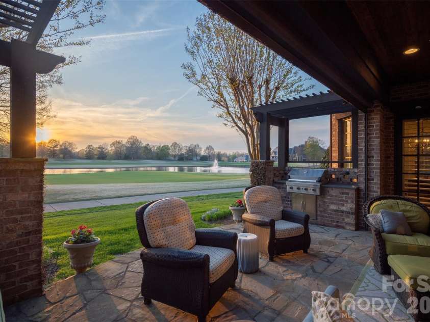 306 Royal Crescent Lane, Waxhaw, NC 28173.  MLS# CAR4373938, YatesRealty ID 16988. Back patio view will never change!  