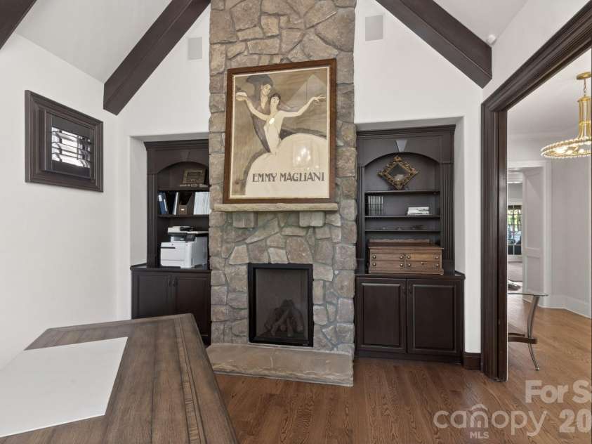 306 Royal Crescent Lane, Waxhaw, NC 28173.  MLS# CAR4373938, YatesRealty ID 16988. Office with vaulted ceilings & stone fireplace/storage