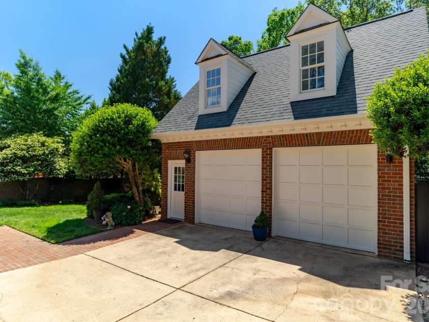 2046 Hopedale Avenue, Charlotte, NC 28207.  MLS# CAR4371805, YatesRealty ID 16992. 2 car garage with finshed room above