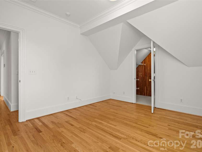 2046 Hopedale Avenue, Charlotte, NC 28207.  MLS# CAR4371805, YatesRealty ID 16992. Bedroom 5 with cedar closet and secret nook behind the closet