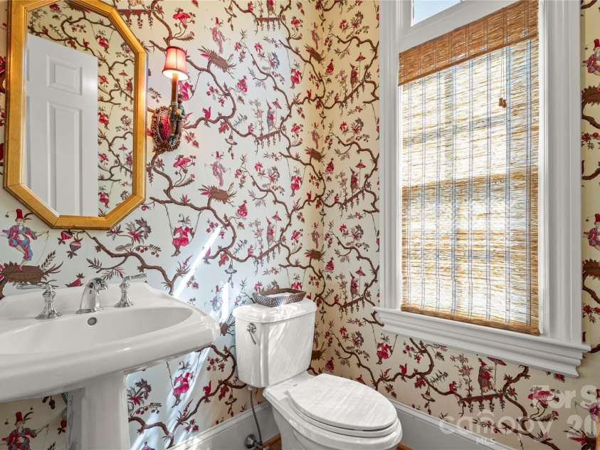 2046 Hopedale Avenue, Charlotte, NC 28207.  MLS# CAR4371805, YatesRealty ID 16992. Fun powder room tucked away behind great room