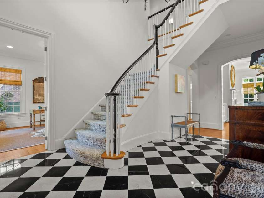 2046 Hopedale Avenue, Charlotte, NC 28207.  MLS# CAR4371805, YatesRealty ID 16992. Gracious foyer with marble flooring
