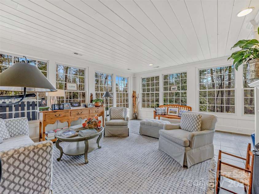 74 Forest Road, Asheville, NC 28803.  MLS# CAR4223182, YatesRealty ID 16992. Sunroom/family rooom