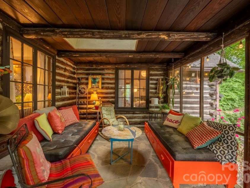 2107 Mandarin Boulevard, Charlotte, NC 28205.  MLS# CAR4341340, YatesRealty ID 17003. Front screened porch