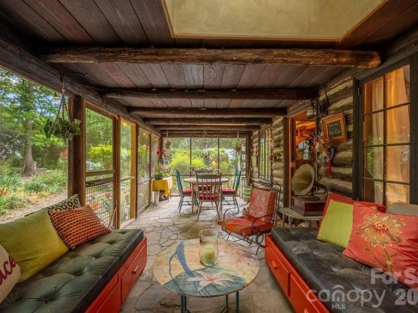 2107 Mandarin Boulevard, Charlotte, NC 28205.  MLS# CAR4341340, YatesRealty ID 17003. Front screened porch
