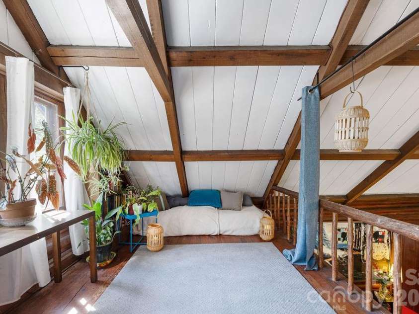 2107 Mandarin Boulevard, Charlotte, NC 28205.  MLS# CAR4341340, YatesRealty ID 17003. Loft over living/dining area