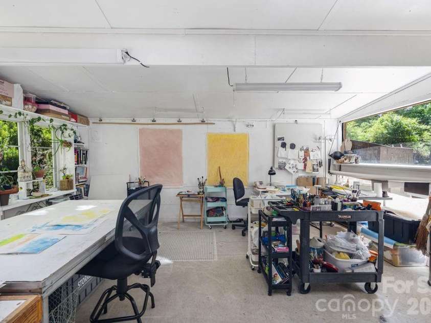 2107 Mandarin Boulevard, Charlotte, NC 28205.  MLS# CAR4341340, YatesRealty ID 17003. Studio/office space off of living/dining area