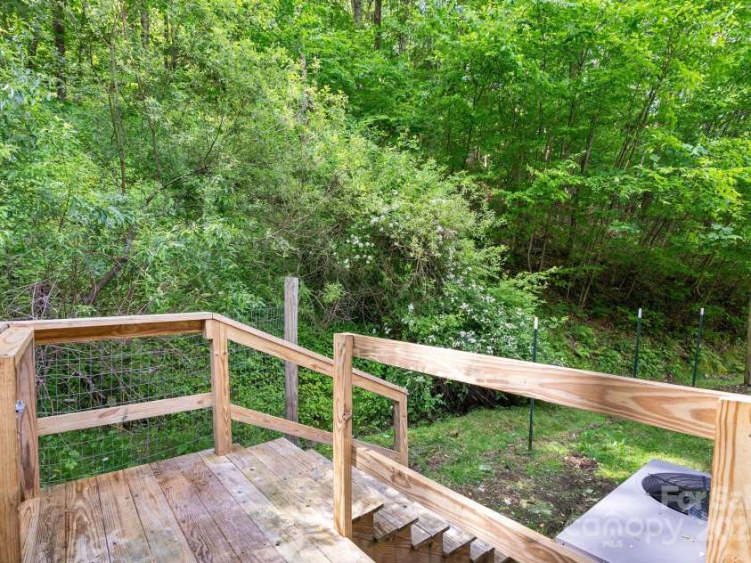 370 Fox Cove Road, Mars Hill, NC 28754.  MLS# CAR4260520, YatesRealty ID 17004. Back of home