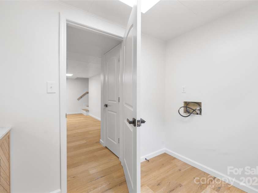 1904 27th Avenue Drive, Hickory, NC 28601.  MLS# CAR4247180, YatesRealty ID 17005. Laundry located in half bath.