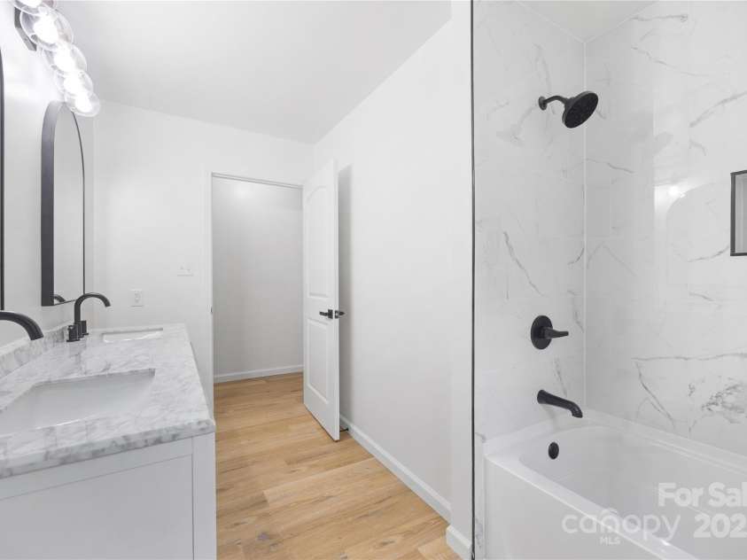 1904 27th Avenue Drive, Hickory, NC 28601.  MLS# CAR4247180, YatesRealty ID 17005. Stunning tile work in the shower/tub combo.