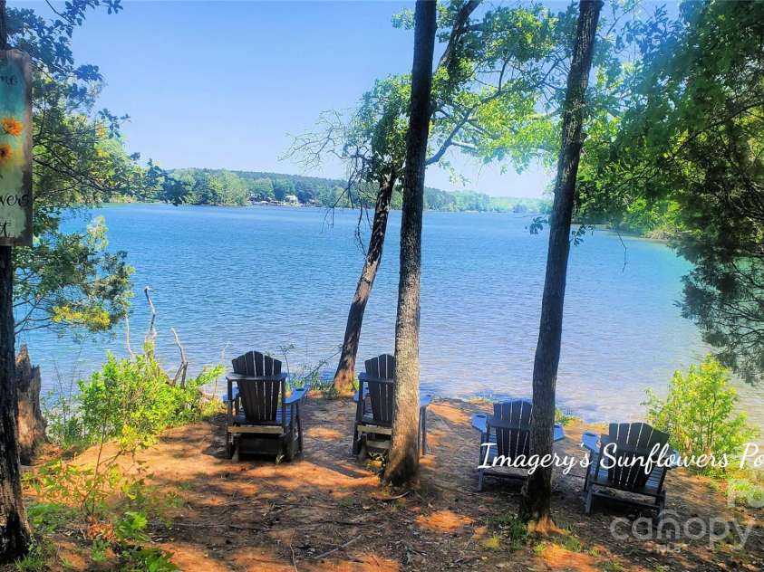 1360 Dali Boulevard, Mount Holly, NC 28120.  MLS# CAR4255366, YatesRealty ID 17006. Find serenity at Sunflowers Point waterside park