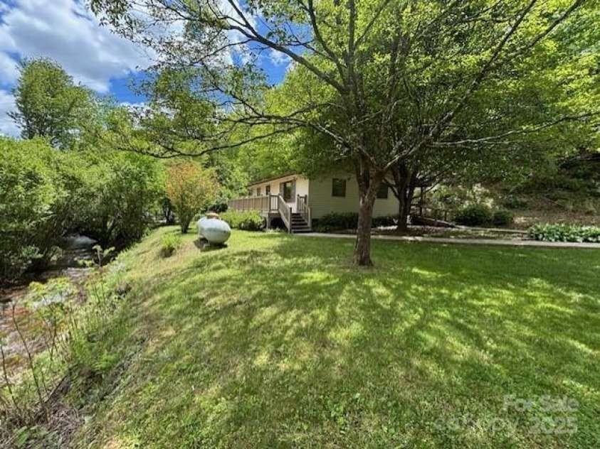 45 Old Cove Road, Sylva, NC 28779.  MLS# CAR4259055, YatesRealty ID 17007. 