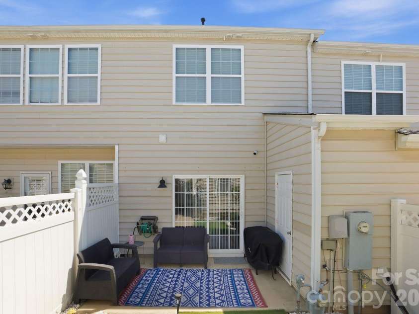 8512 Sunset Hill Road, Waxhaw, NC 28173.  MLS# CAR4370313, YatesRealty ID 17009. Back patio