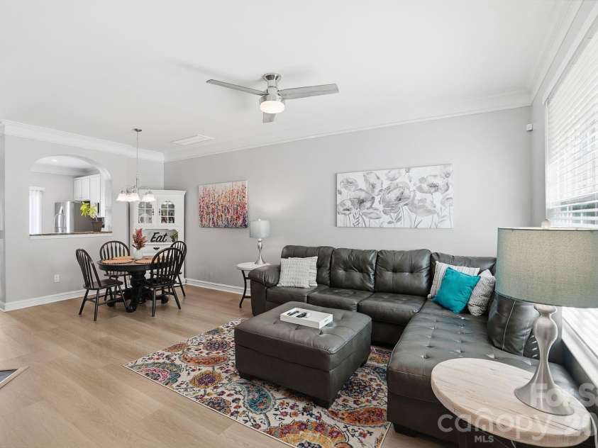 8512 Sunset Hill Road, Waxhaw, NC 28173.  MLS# CAR4370313, YatesRealty ID 17009. Great room and dining area
