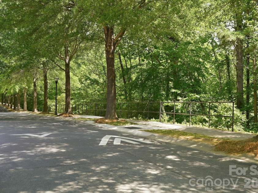 8512 Sunset Hill Road, Waxhaw, NC 28173.  MLS# CAR4370313, YatesRealty ID 17009. Walking path - directly across from the home