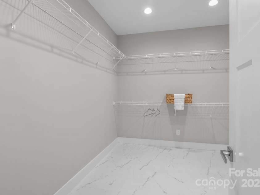 8225 Long Island Road, Catawba, NC 28609.  MLS# CAR4298824, YatesRealty ID 17010. One of two spacious walk-in closets in the primary bedroom, offering generous storage and easy organization.