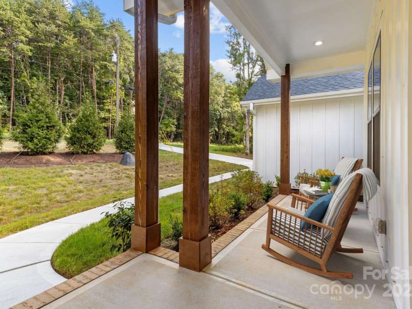 8225 Long Island Road, Catawba, NC 28609.  MLS# CAR4298824, YatesRealty ID 17010. Virtually staged to showcase the front porch's simple and welcoming charm.
