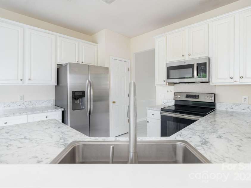 2013 Arbor Crest Court, Charlotte, NC 28262.  MLS# CAR4260816, YatesRealty ID 17013. 
