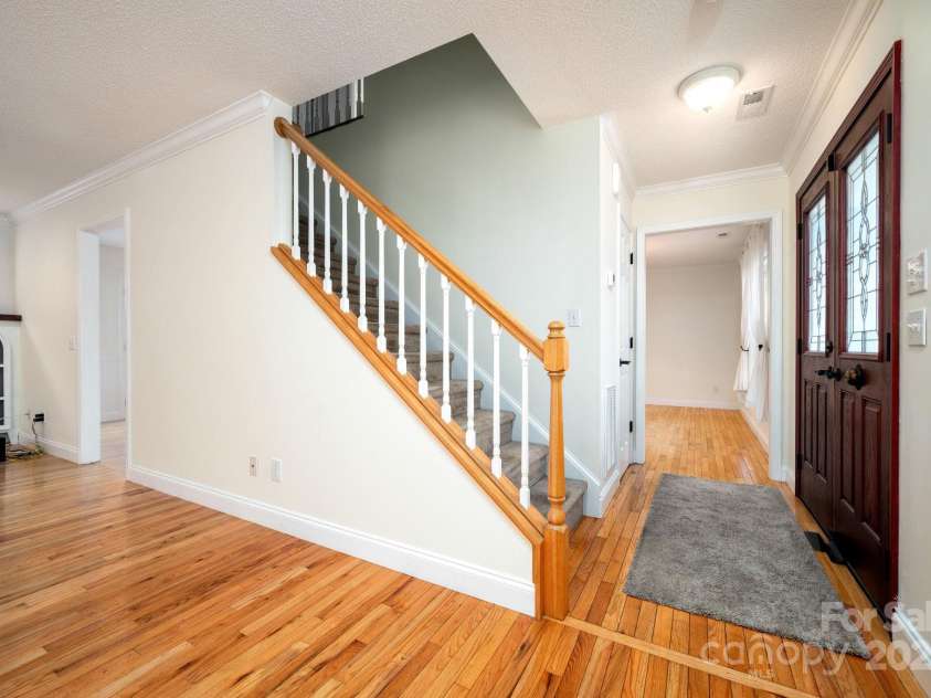 51 Sugar Hill Drive, Weaverville, NC 28787.  MLS# CAR4243411, YatesRealty ID 17014. Entrance and Stairway
