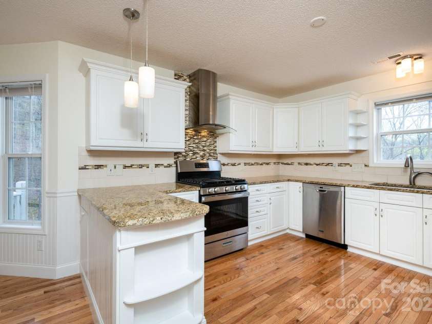 51 Sugar Hill Drive, Weaverville, NC 28787.  MLS# CAR4243411, YatesRealty ID 17014. Granite Countertops and Great Work Space