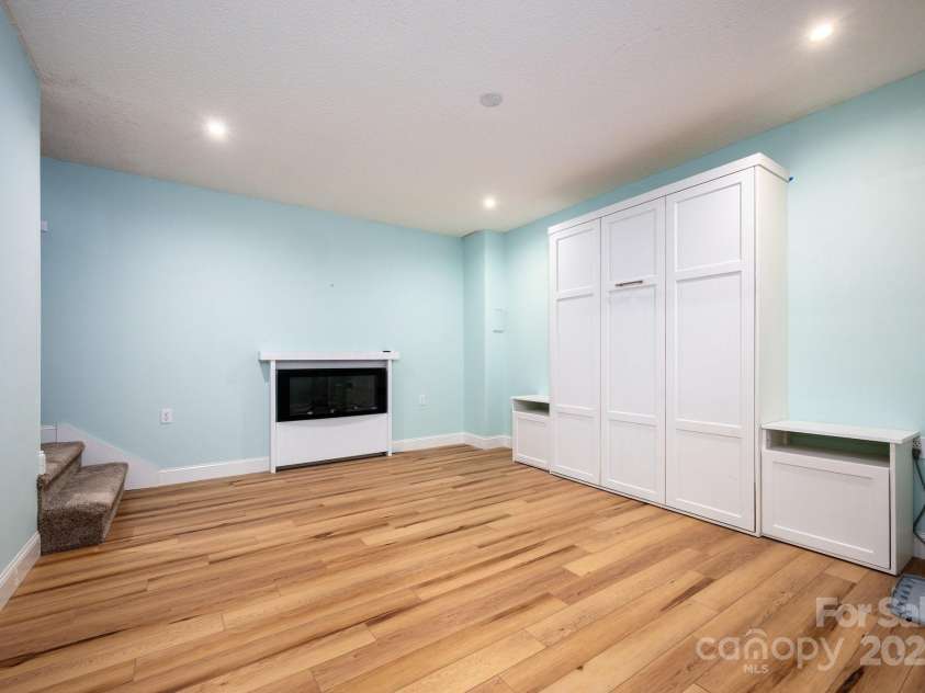 51 Sugar Hill Drive, Weaverville, NC 28787.  MLS# CAR4243411, YatesRealty ID 17014. Lower-Level Bonus Room with Built-In Murphy Bed