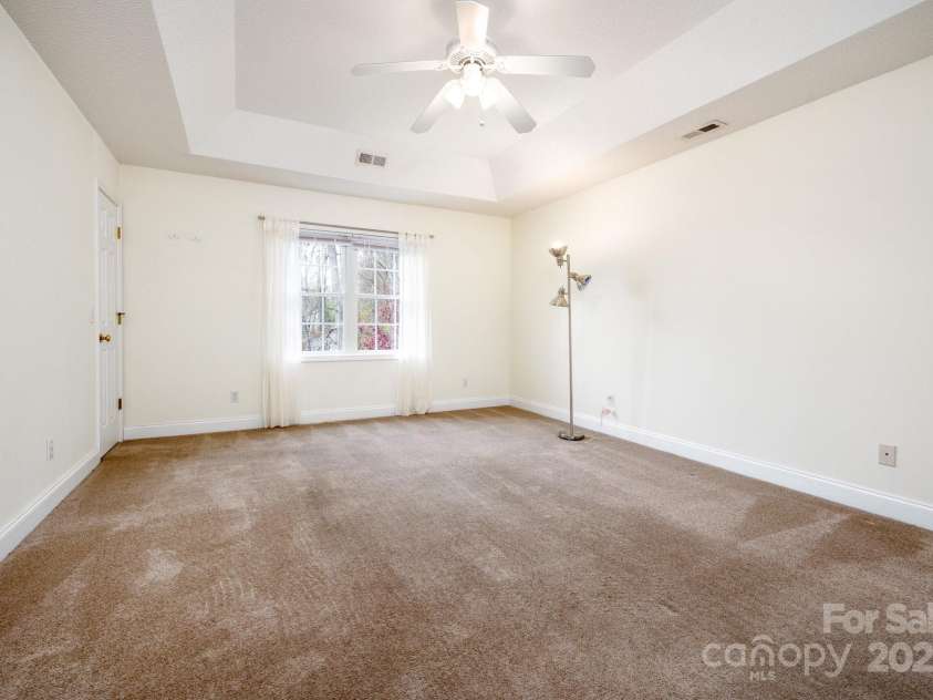 51 Sugar Hill Drive, Weaverville, NC 28787.  MLS# CAR4243411, YatesRealty ID 17014. Primary Bedroom with Tray Ceiling
