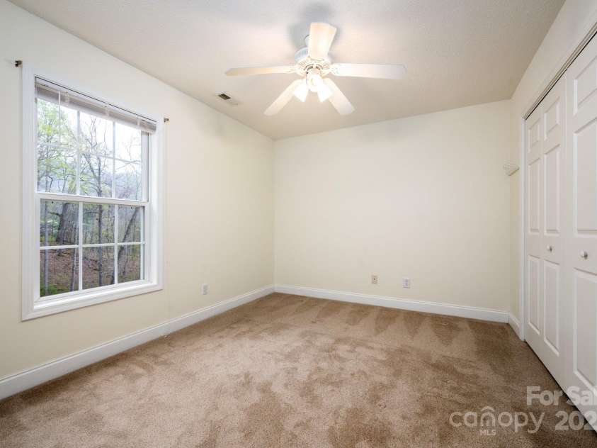 51 Sugar Hill Drive, Weaverville, NC 28787.  MLS# CAR4243411, YatesRealty ID 17014. Second Guest Bedroom with Ceiling Fan