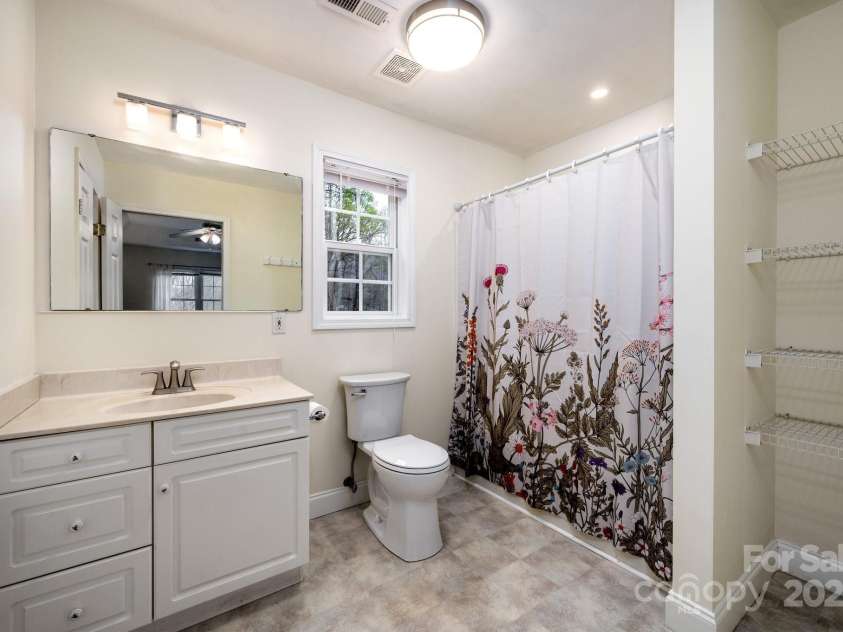 51 Sugar Hill Drive, Weaverville, NC 28787.  MLS# CAR4243411, YatesRealty ID 17014. Spacious Primary Bathroom
