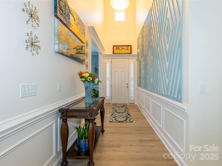 7133 Sumters Camp Trail, Fort Mill, SC 29707.  MLS# CAR4228668, YatesRealty ID 17017. Foyer w/ Art Wall