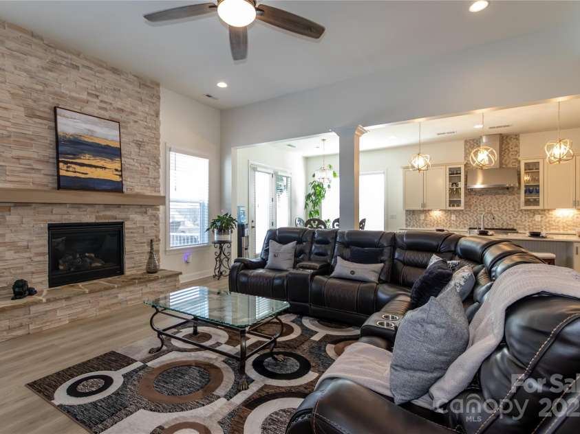 7133 Sumters Camp Trail, Fort Mill, SC 29707.  MLS# CAR4228668, YatesRealty ID 17017. Great Room, Fireplace w. Stone Hearth
