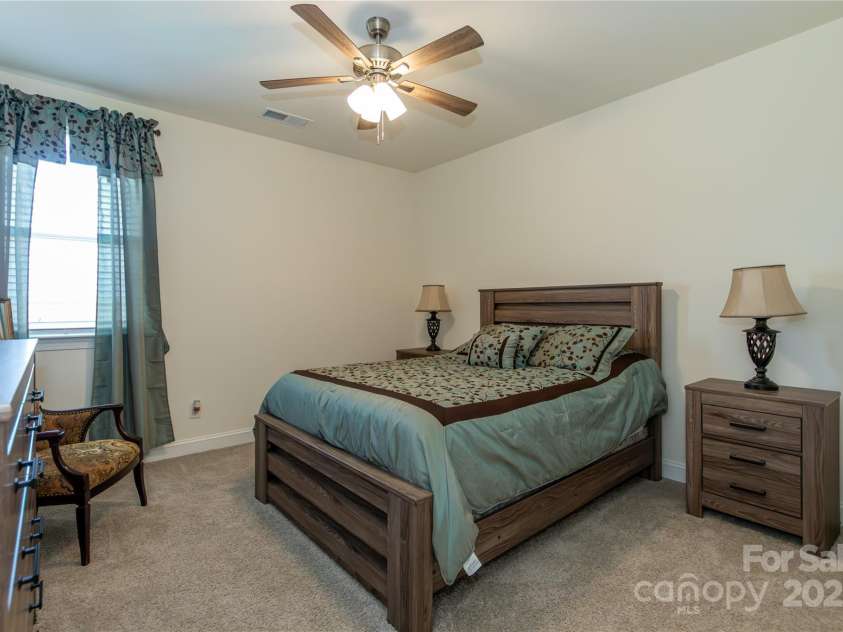 7133 Sumters Camp Trail, Fort Mill, SC 29707.  MLS# CAR4228668, YatesRealty ID 17017. Upstairs Bedroom