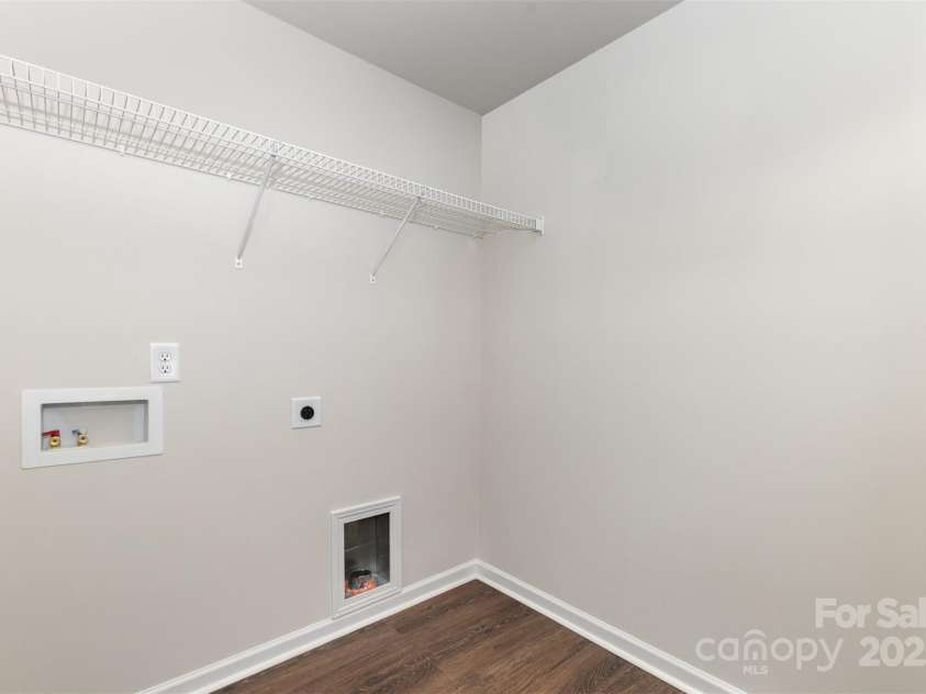 2051 Sadler Woods Lane, Charlotte, NC 28214.  MLS# CAR4265922, YatesRealty ID 17020. Laundry room on 2nd floor. Representative Photo.