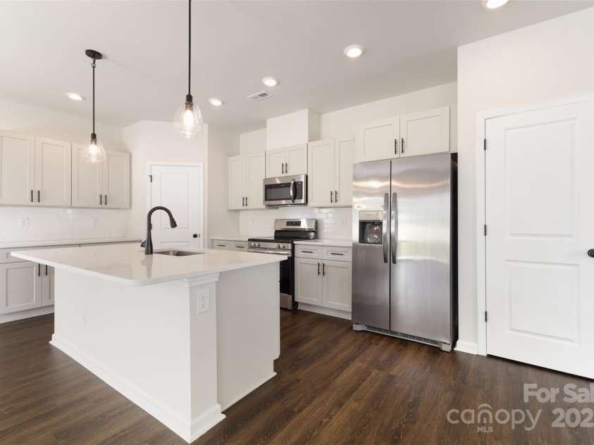 2051 Sadler Woods Lane, Charlotte, NC 28214.  MLS# CAR4265922, YatesRealty ID 17020. Soft-close cabinets. Representational Photo.