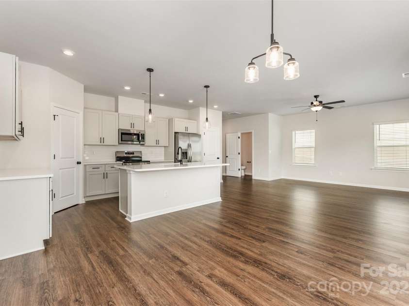 2051 Sadler Woods Lane, Charlotte, NC 28214.  MLS# CAR4265922, YatesRealty ID 17020. Spacious Kitchen. Representational Photo.