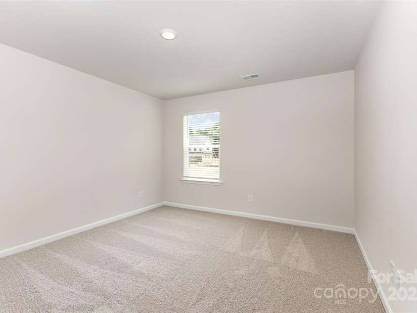 2051 Sadler Woods Lane, Charlotte, NC 28214.  MLS# CAR4265922, YatesRealty ID 17020. Spare bedroom 2. Representative Photo.