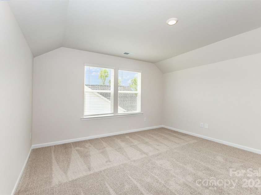 2051 Sadler Woods Lane, Charlotte, NC 28214.  MLS# CAR4265922, YatesRealty ID 17020. Third Floor Bedroom. Representative Photo.