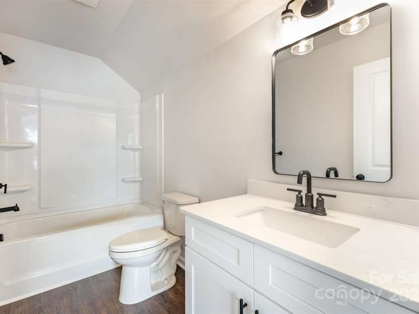 2051 Sadler Woods Lane, Charlotte, NC 28214.  MLS# CAR4265922, YatesRealty ID 17020. Third Floor Full Bathroom. Representative Photo.