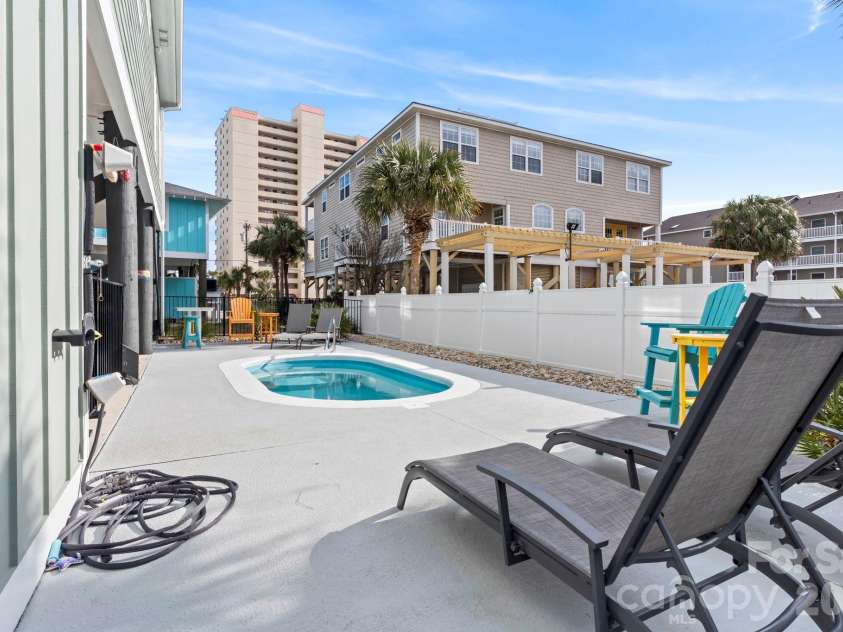 119 Sunset Drive, Garden City, SC 29576.  MLS# CAR4375342, YatesRealty ID 17022. 