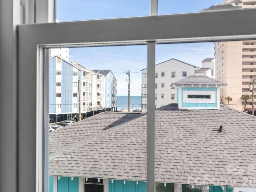 119 Sunset Drive, Garden City, SC 29576.  MLS# CAR4375342, YatesRealty ID 17022. 
