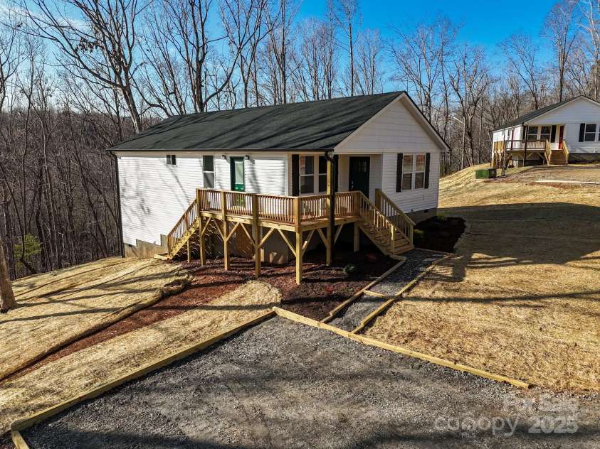 5225 Howard Gap Road, Saluda, NC 28773.  MLS# CAR4186020, YatesRealty ID 17025. 