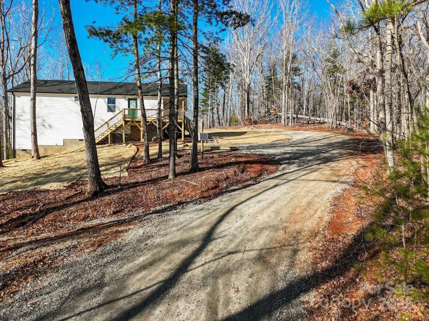 5225 Howard Gap Road, Saluda, NC 28773.  MLS# CAR4186020, YatesRealty ID 17025. 