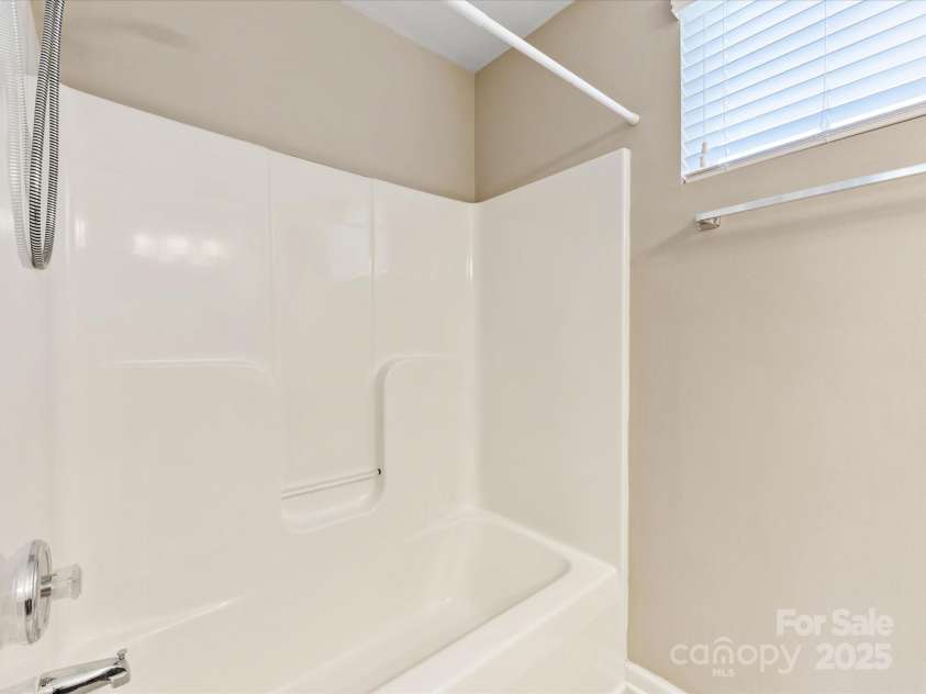 7325 Forrest Rader Drive, Mint Hill, NC 28227.  MLS# CAR4250801, YatesRealty ID 17027. Second level guest bathroom