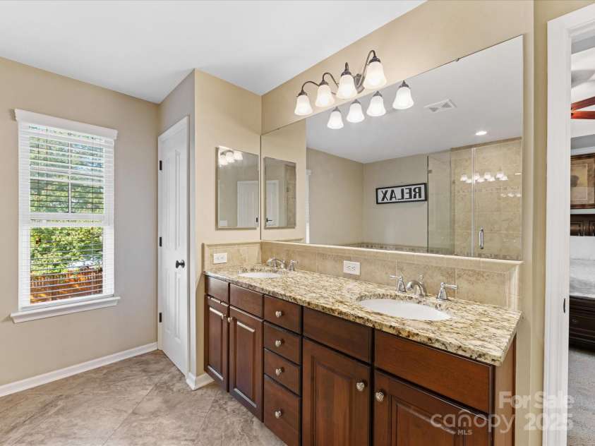 7325 Forrest Rader Drive, Mint Hill, NC 28227.  MLS# CAR4250801, YatesRealty ID 17027. Second level primary bathroom