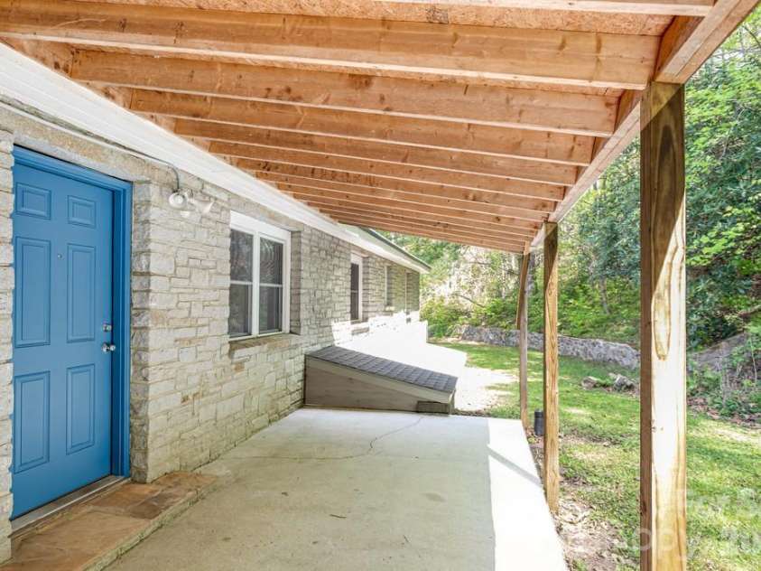 2629 Soco Road, Maggie Valley, NC 28751.  MLS# CAR4374834, YatesRealty ID 17029. Covered back patio