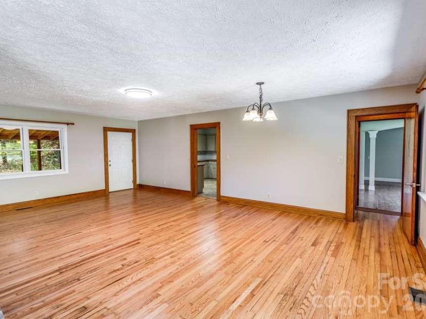 2629 Soco Road, Maggie Valley, NC 28751.  MLS# CAR4374834, YatesRealty ID 17029. Newly refinished floors