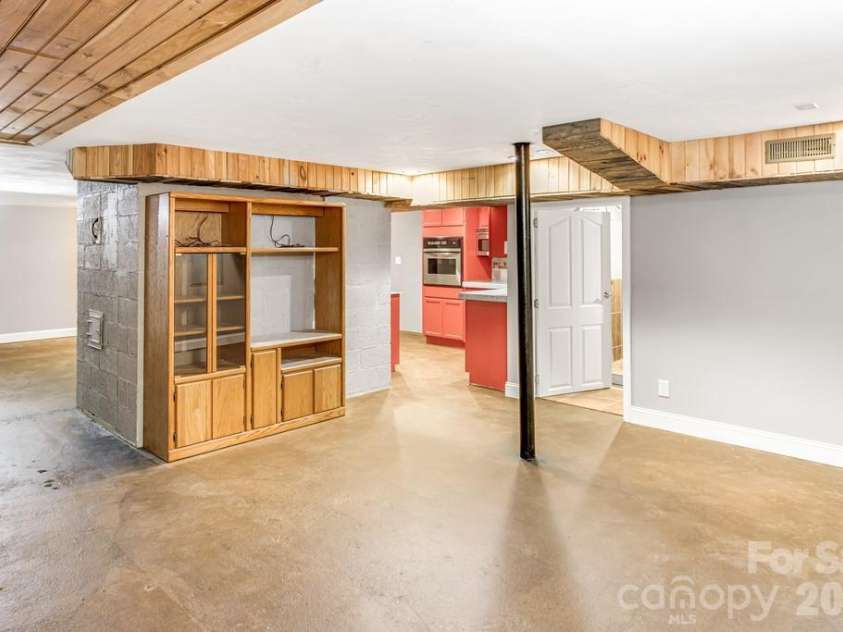 2629 Soco Road, Maggie Valley, NC 28751.  MLS# CAR4374834, YatesRealty ID 17029. Open and functional basement level