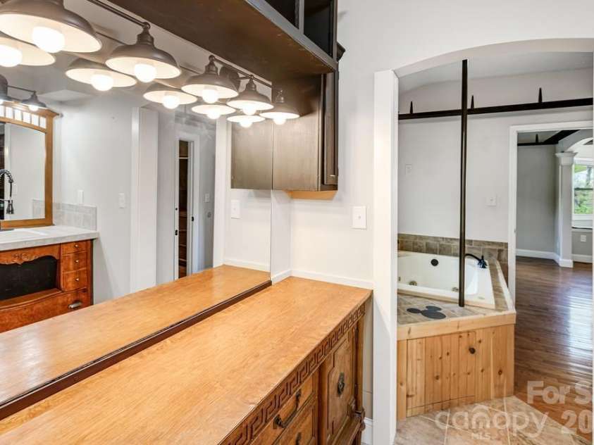 2629 Soco Road, Maggie Valley, NC 28751.  MLS# CAR4374834, YatesRealty ID 17029. Primary bath boast fabulous lighting