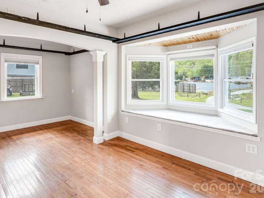 2629 Soco Road, Maggie Valley, NC 28751.  MLS# CAR4374834, YatesRealty ID 17029. Primary bedroom with sitting area