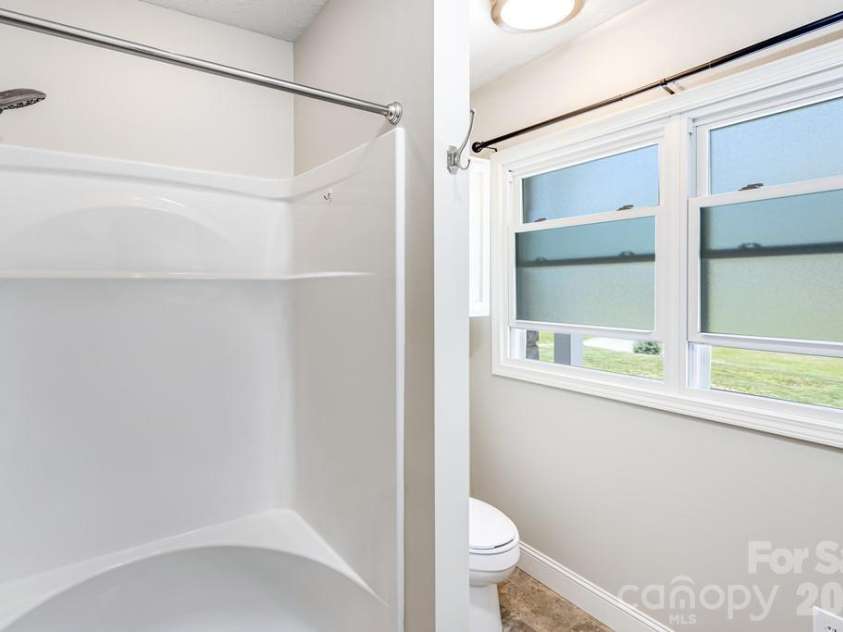 2629 Soco Road, Maggie Valley, NC 28751.  MLS# CAR4374834, YatesRealty ID 17029. Remodeled Shower in Bath 3